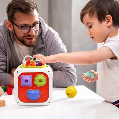 Kostka edukacyjna sensoryczna 8w1 – sorter, klocki, cymbałki, gumki, przeplatanki