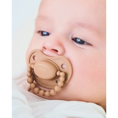 LUU Kids smoczek pozycjonujący Milk Hazelnut – rozwój i bezpieczeństwo